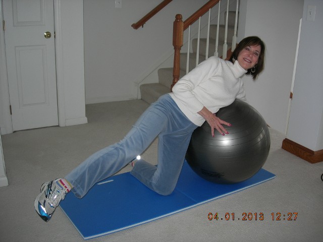 Stephanie Doing Supported Leg Lifts on a Ball