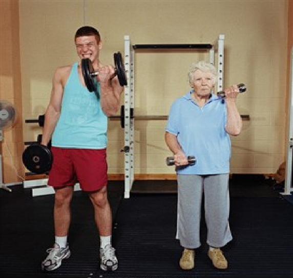 Young Man and Elderly Woman Exercising